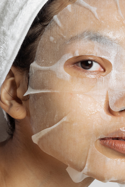 Closeup Portrait of Woman with Facial Mask